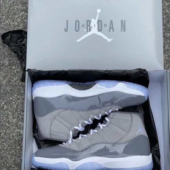In hand now is the Jordan 11 cool gray 2021 size men 8